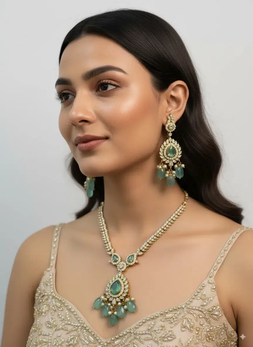 Pastel Green Kundan Necklace Set with Earrings for Women worn by model, featuring teardrop-shaped pendant and delicate earrings.