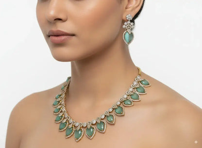 Pastel Green CZ Necklace Set with Earrings featuring delicate green stones and sparkling CZ diamonds.