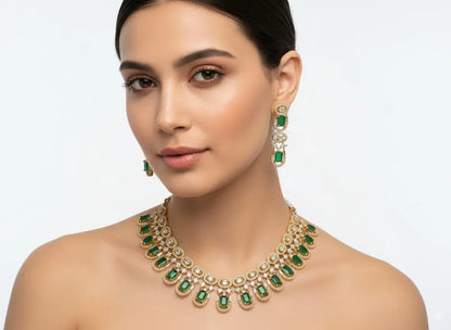 Emerald Green CZ Necklace Set with Earrings worn by a model, featuring intricate floral design and sparkling CZ diamonds.