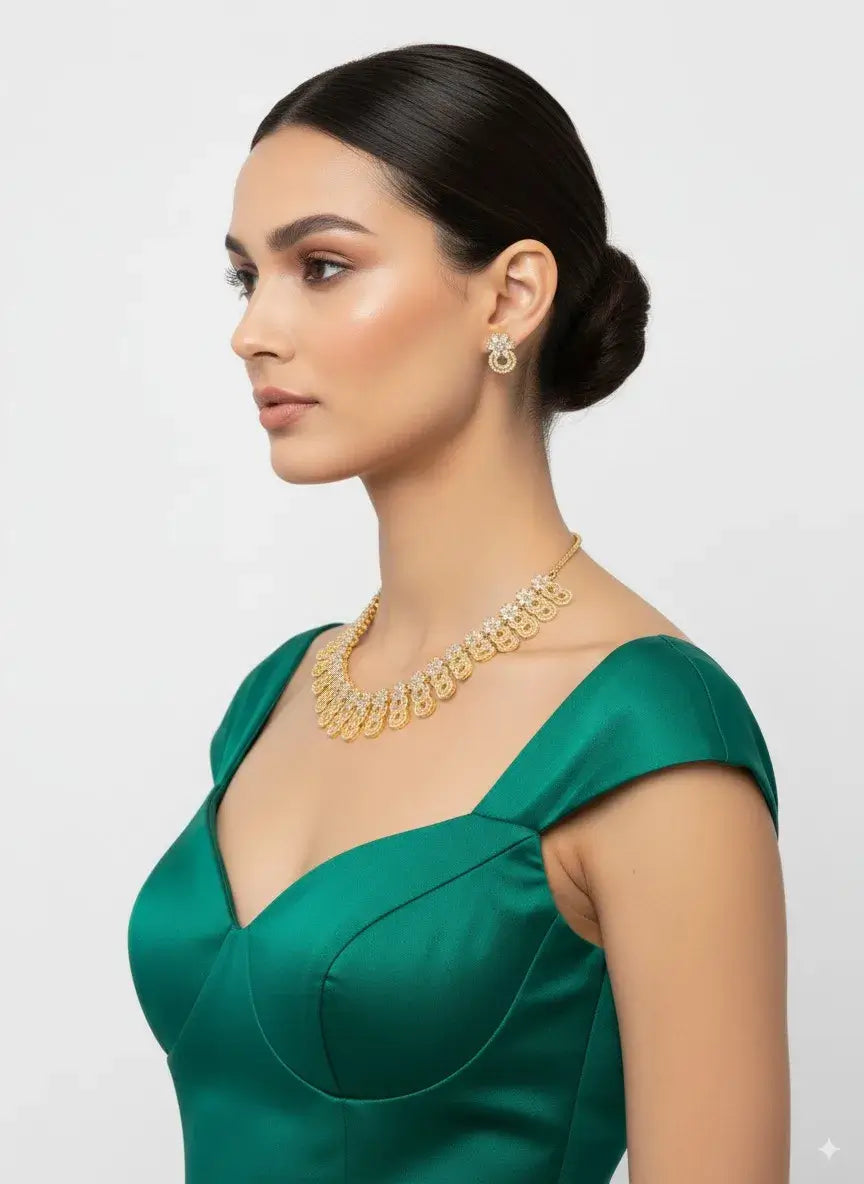 Model showcasing the Golden Circular CZ Necklace Set with Matching Earrings, exuding elegance in a green dress.