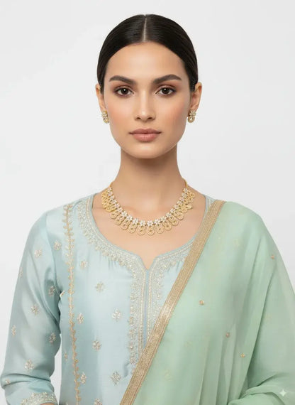 Golden Circular CZ Necklace Set with Matching Earrings showcased on a model in traditional attire.