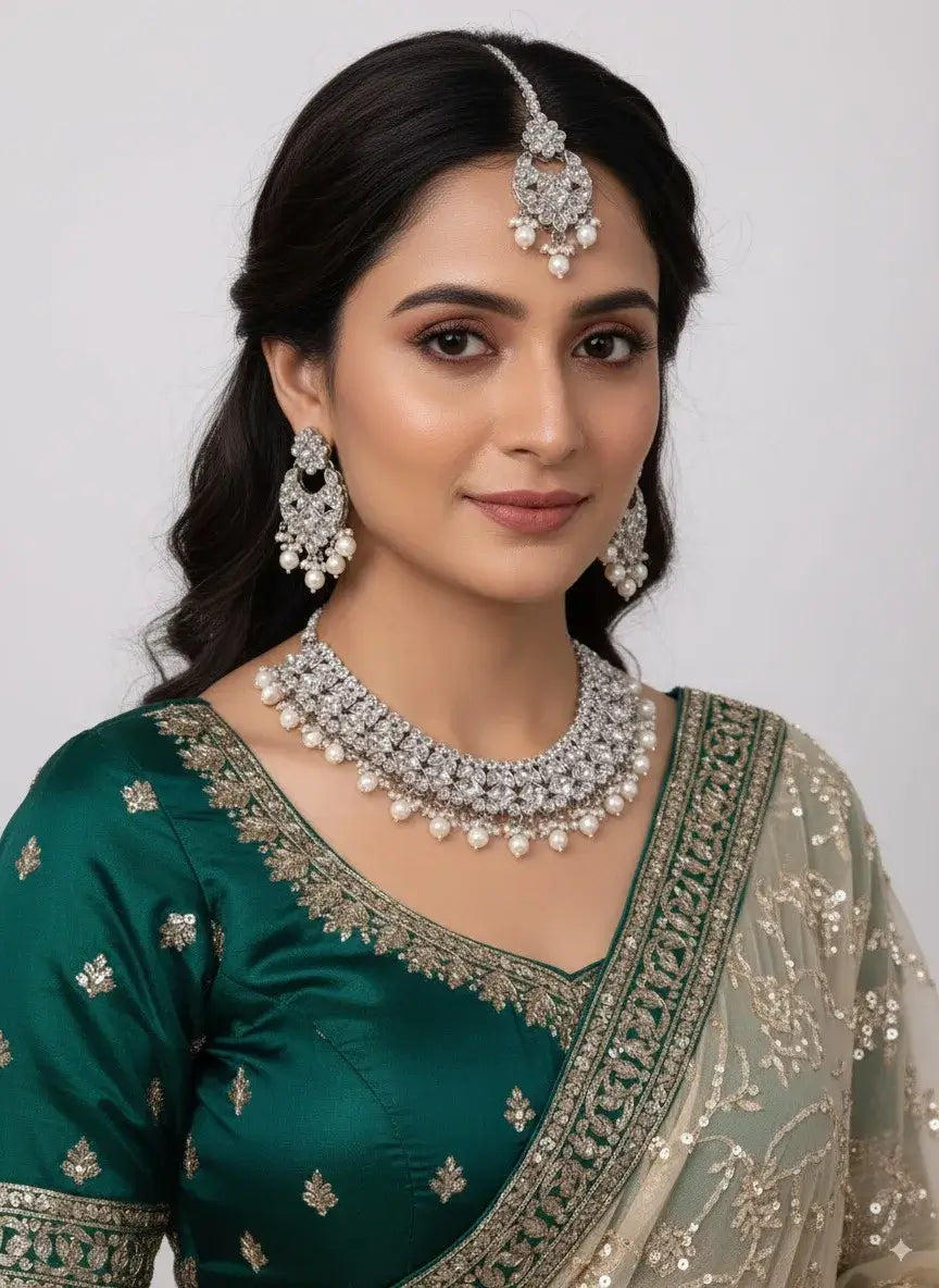bridal cz diamond choker necklace set with pearls & maang tikka styled with an elegant green saree.