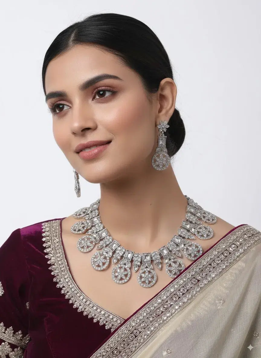 luxury cz diamond look statement necklace set with earrings worn by a model in a traditional outfit.