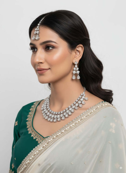 Layered CZ Diamond Look Necklace Set with Long Earrings worn by a model in a traditional outfit, showcasing elegance and sparkle.
