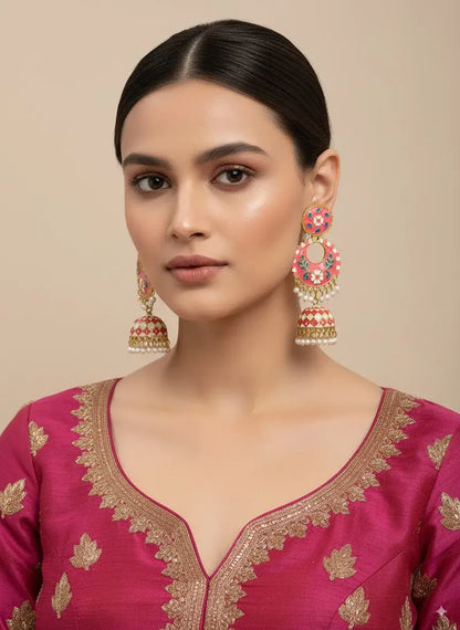Gehna Pink Enamel Jhumka Earrings with Pearl Drops – Premium Festive Jewellery for Women worn by a model.