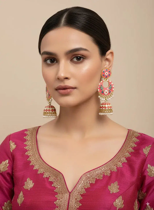 Gehna Pink Enamel Jhumka Earrings with Pearl Drops – Premium Festive Jewellery for Women worn by a model.