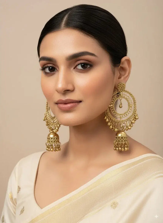 Gold Plated Big Round Hoop Jhumka Earrings for Women | Bridal & Party Wear worn by a model, showcasing elegant design.