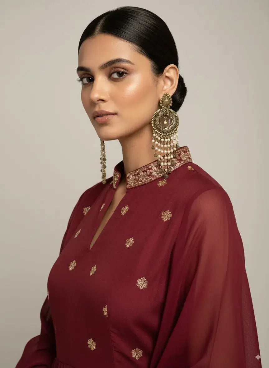 Antique Gold Plated Long Pearl Tassel Earrings – Bridal & Festive Statement Jewellery worn by a model in ethnic attire.