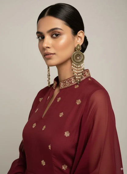 Antique Gold Plated Long Pearl Tassel Earrings – Bridal & Festive Statement Jewellery worn by a model in ethnic attire.