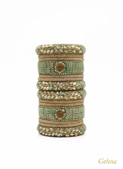 Green Bridal Kundan Floral Bangles Set – Gehna showcasing intricate floral patterns and kundan stones.