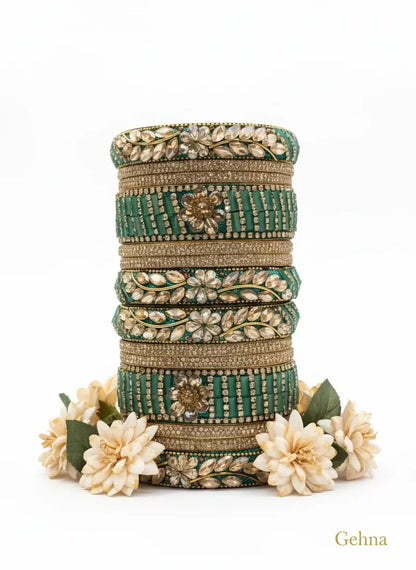 Dark Green Bridal Kundan Bangles Set – Gehna featuring floral motifs and sparkling stones for elegant bridal wear.