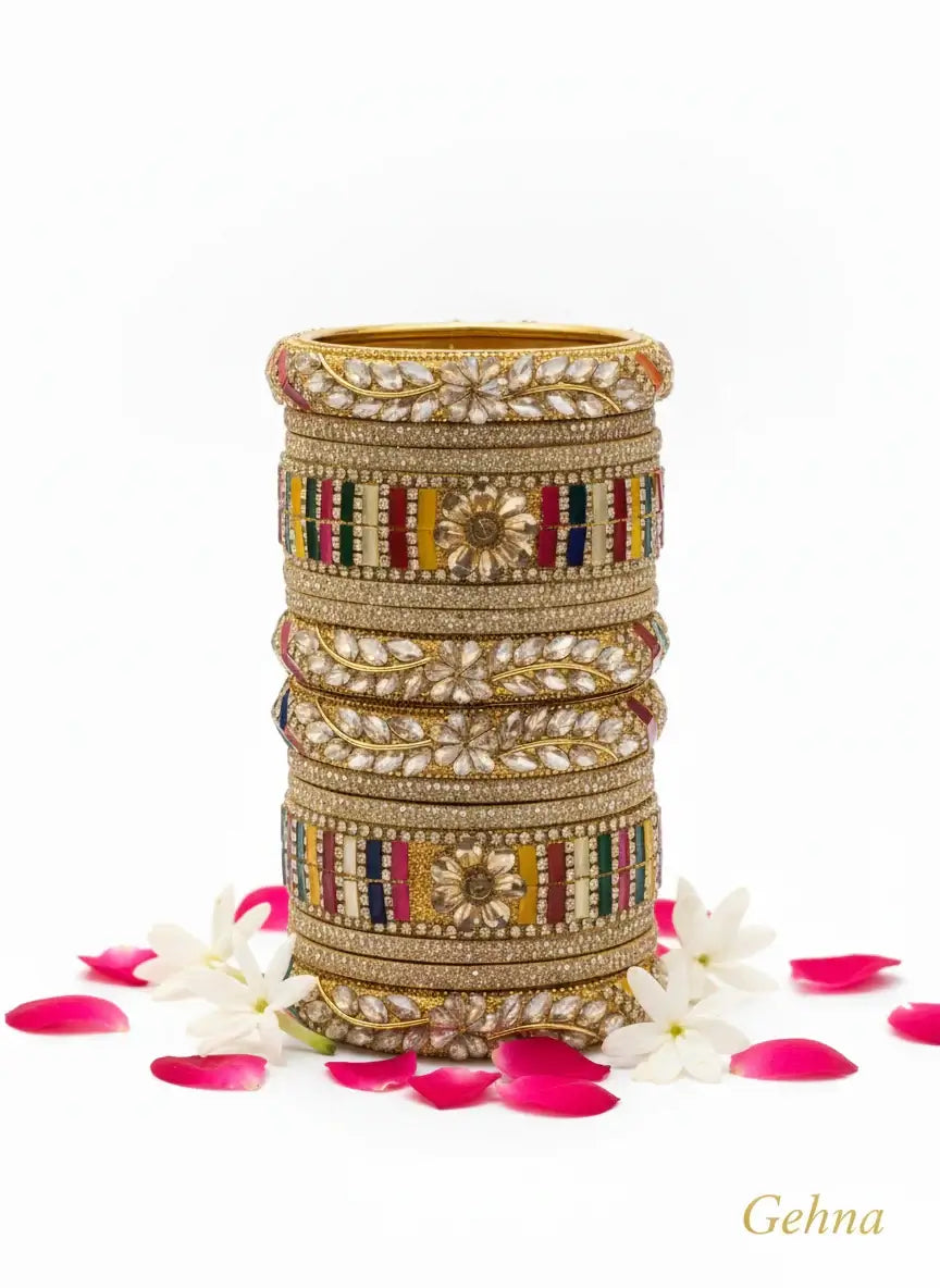 Multi-Color Bridal Kundan Bangles Set – Gehna displayed with flowers and petals, showcasing vibrant colors and intricate designs.