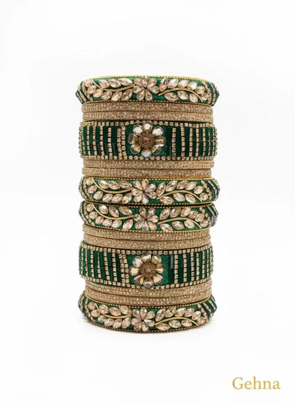 Emerald Green Bridal Kundan Bangles Set – Gehna featuring intricate floral motifs and sparkling kundan stones.