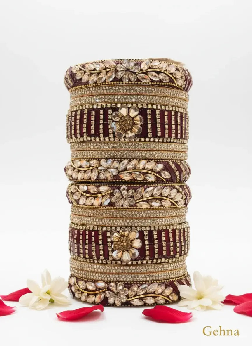 Maroon Bridal Kundan Floral Bangles Set – Gehna featuring floral motifs and golden finish.