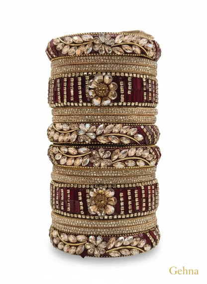 Maroon Bridal Kundan Floral Bangles Set – Gehna featuring intricate floral designs and sparkling stones.