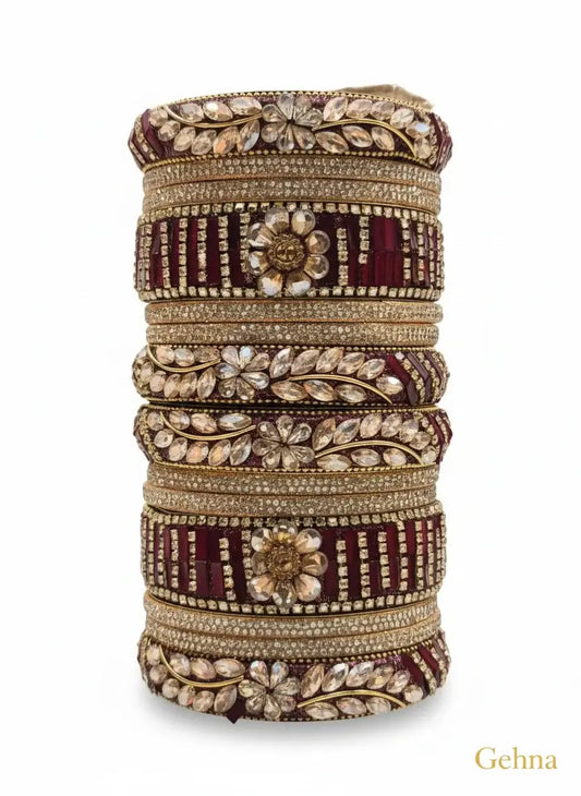 Maroon Bridal Kundan Floral Bangles Set – Gehna featuring intricate floral designs and sparkling stones.