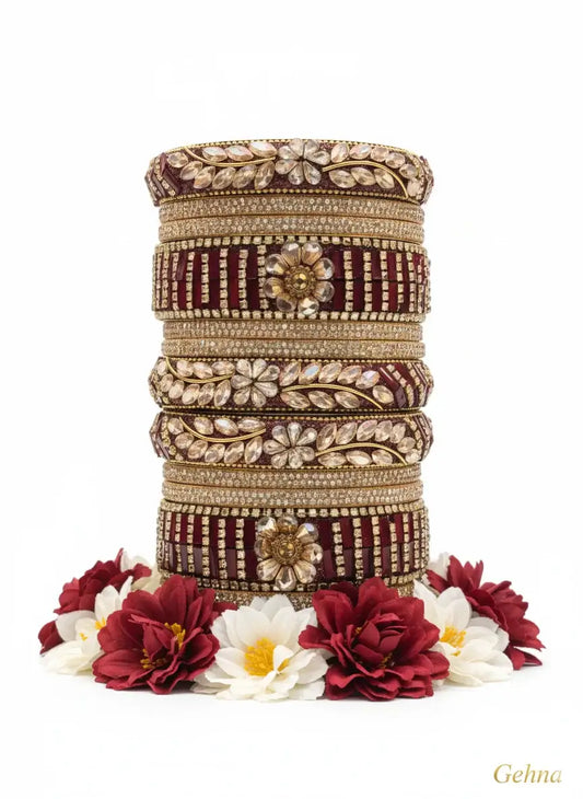 Maroon Bridal Kundan Floral Bangles Set – Gehna displayed with floral accents.