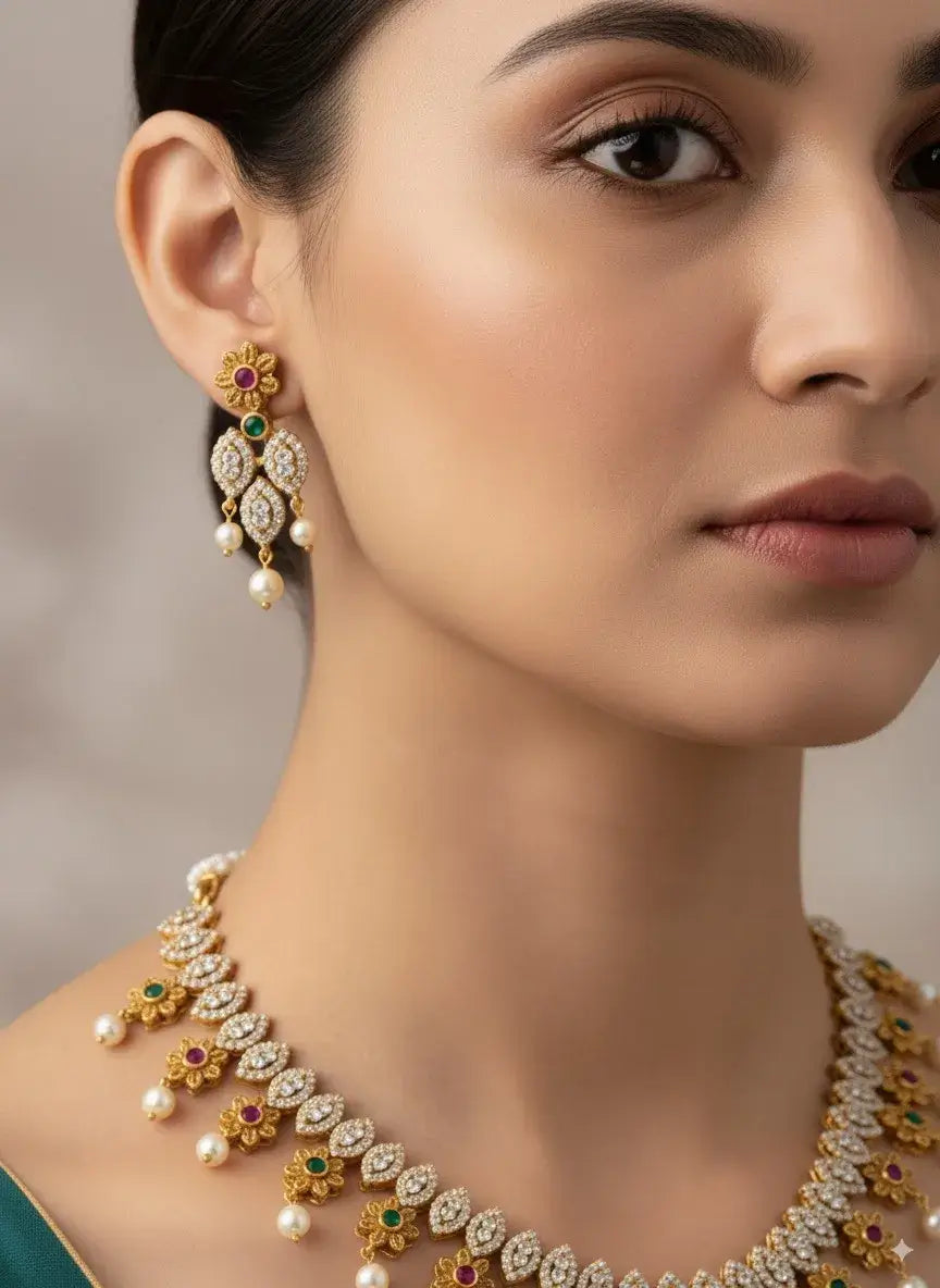 floral cz pearl necklace set with multicolor stones & earrings worn by a model showcasing elegance and traditional beauty.