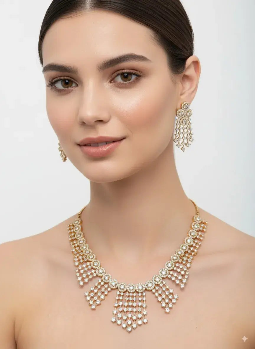 model wearing a cz cascading necklace set with statement earrings, showcasing intricate floral and waterfall designs.