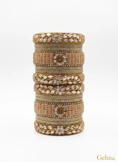 tylish Gold Plated Imitation Bangles Online | Gehna Jewellery stacked elegantly displaying intricate designs.