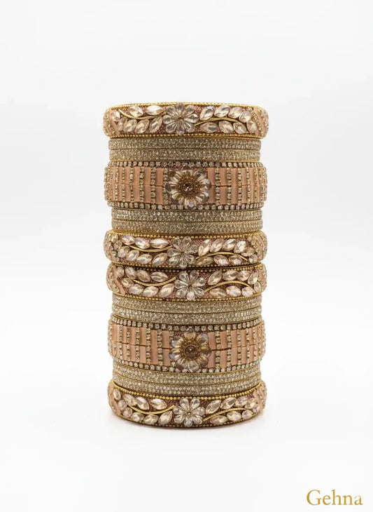 tylish Gold Plated Imitation Bangles Online | Gehna Jewellery stacked elegantly displaying intricate designs.
