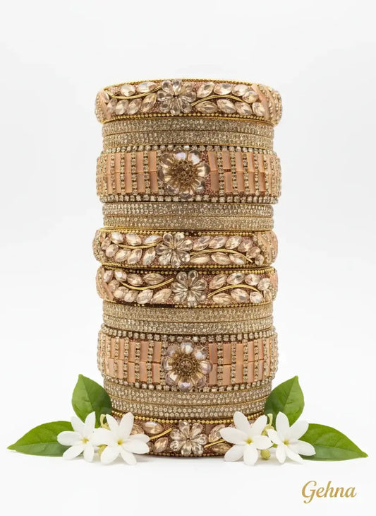 Peach Golden Floral Stone Bangles Set – Designer Bridal & Festive Jewelry stacked elegantly with floral motifs and crystals.