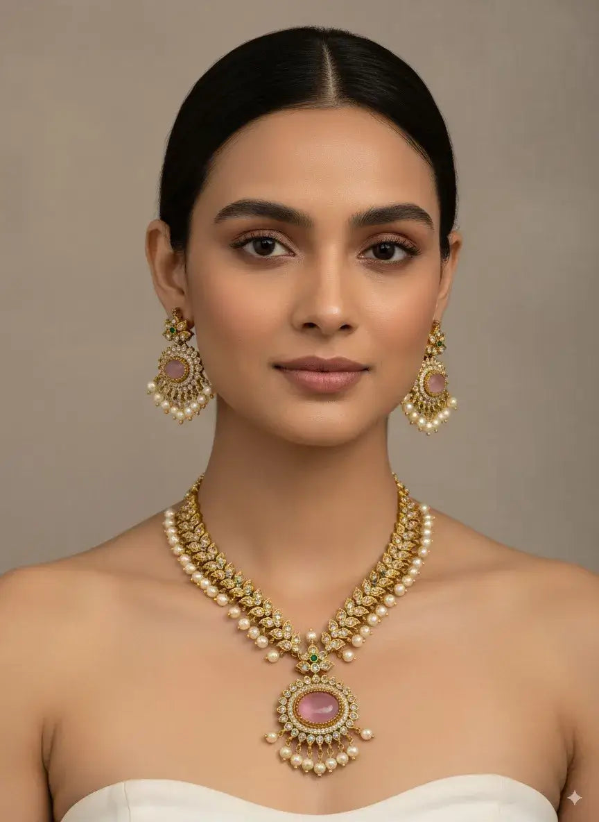 pink stone pearl kundan necklace set with earrings worn by a model, showcasing its elegance and traditional charm.