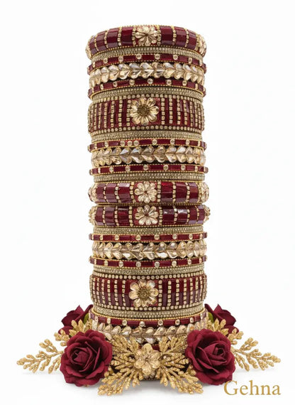 Dark Red Gold Bridal Bangle Set – 26 Piece Kundan & Stone Work featuring intricate designs and embellishments.