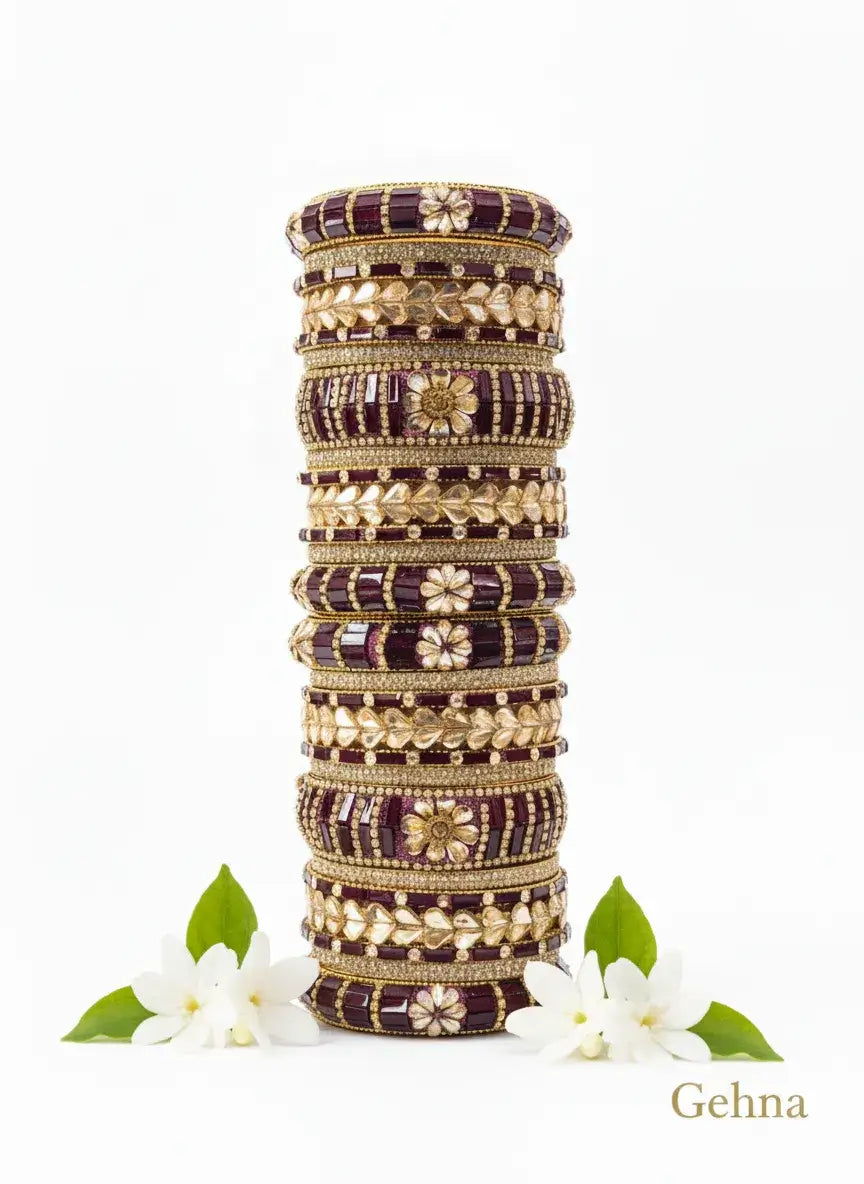 maroon gold bridal bangle set – 26 piece kundan & stone work displayed with intricate design and floral accents.