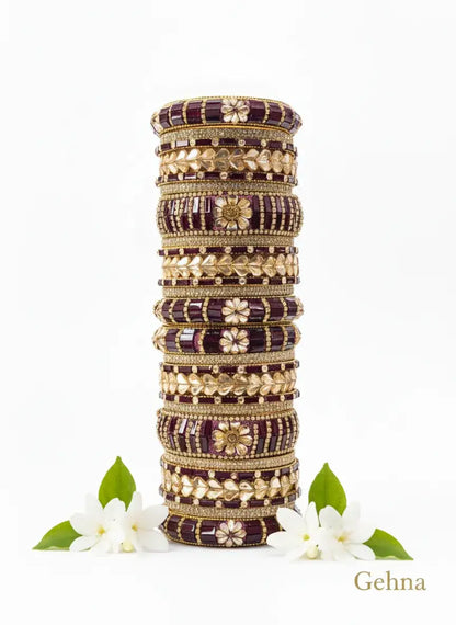 Maroon Gold Bridal Bangle Set – 26 Piece Kundan & Stone Work displayed with intricate design and floral accents.