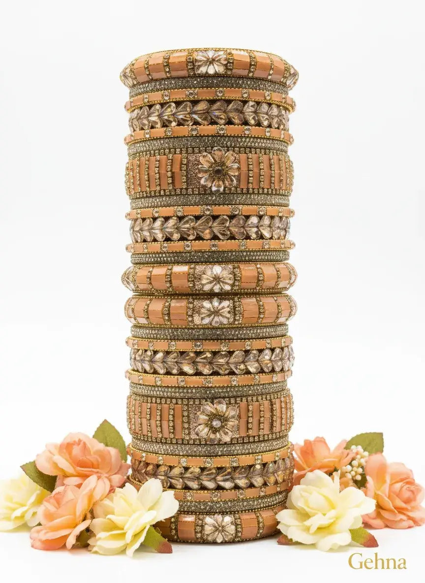 Peach-Gold Bridal Bangle Set – 26 Pieces Kundan & Stone Work by Gehna displayed with floral accents.