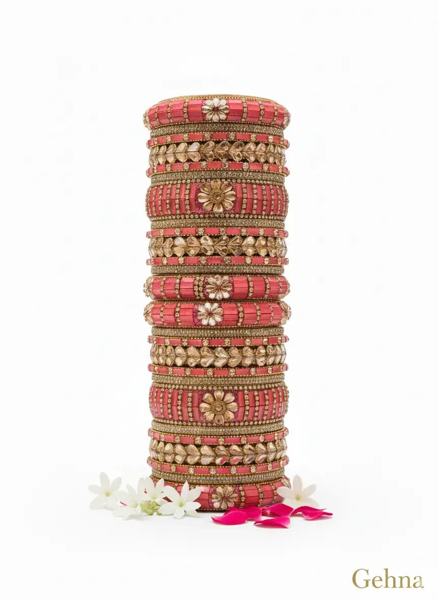 pink gold bridal bangle set — 26 pcs kundan stone work | gehna displayed with floral accents.