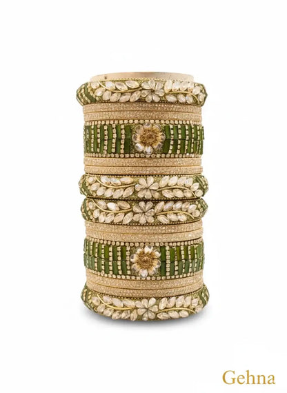 Green Bridal Chuda Set for Wedding | Gehna featuring sparkling stones and floral detailing.