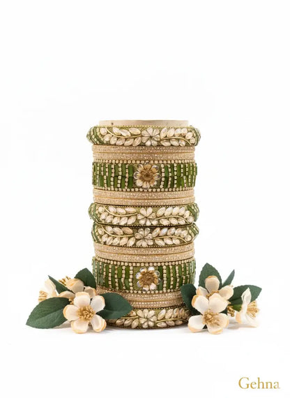 Green Bridal Chuda Set for Wedding | Gehna with floral detailing and sparkling stones, perfect for bridal elegance.