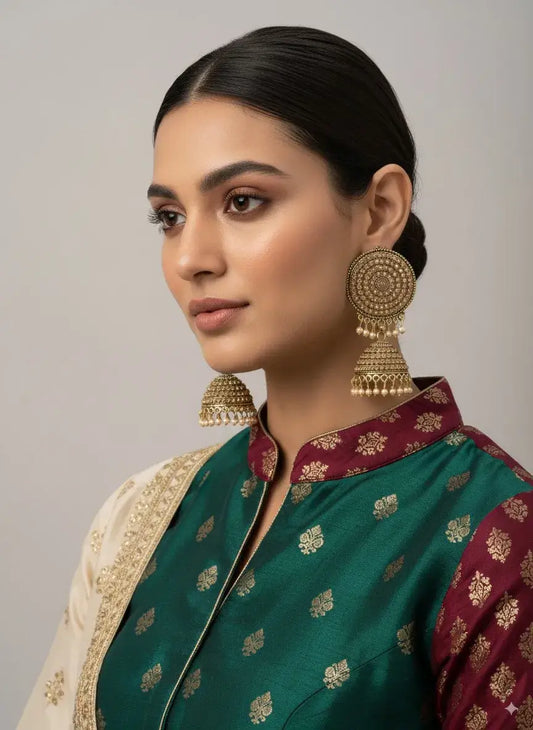 Gold Plated Round Jhumka Earrings for Women | Traditional Bridal Party Wear worn by model in elegant attire.