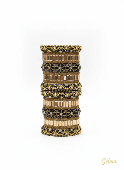 Navy Blue Gold Bridal Floral Stone Bangles Set – Gehna Designer Collection featuring intricate floral designs and shimmering details.