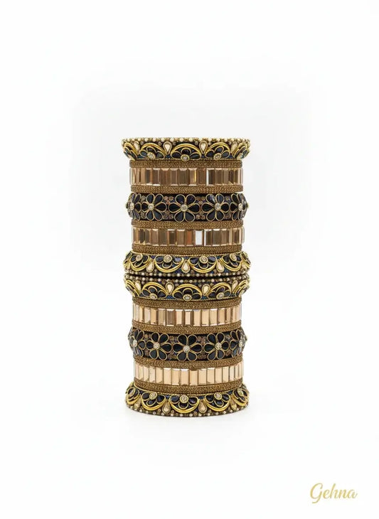 Navy Blue Gold Bridal Floral Stone Bangles Set – Gehna Designer Collection featuring intricate floral designs and shimmering details.