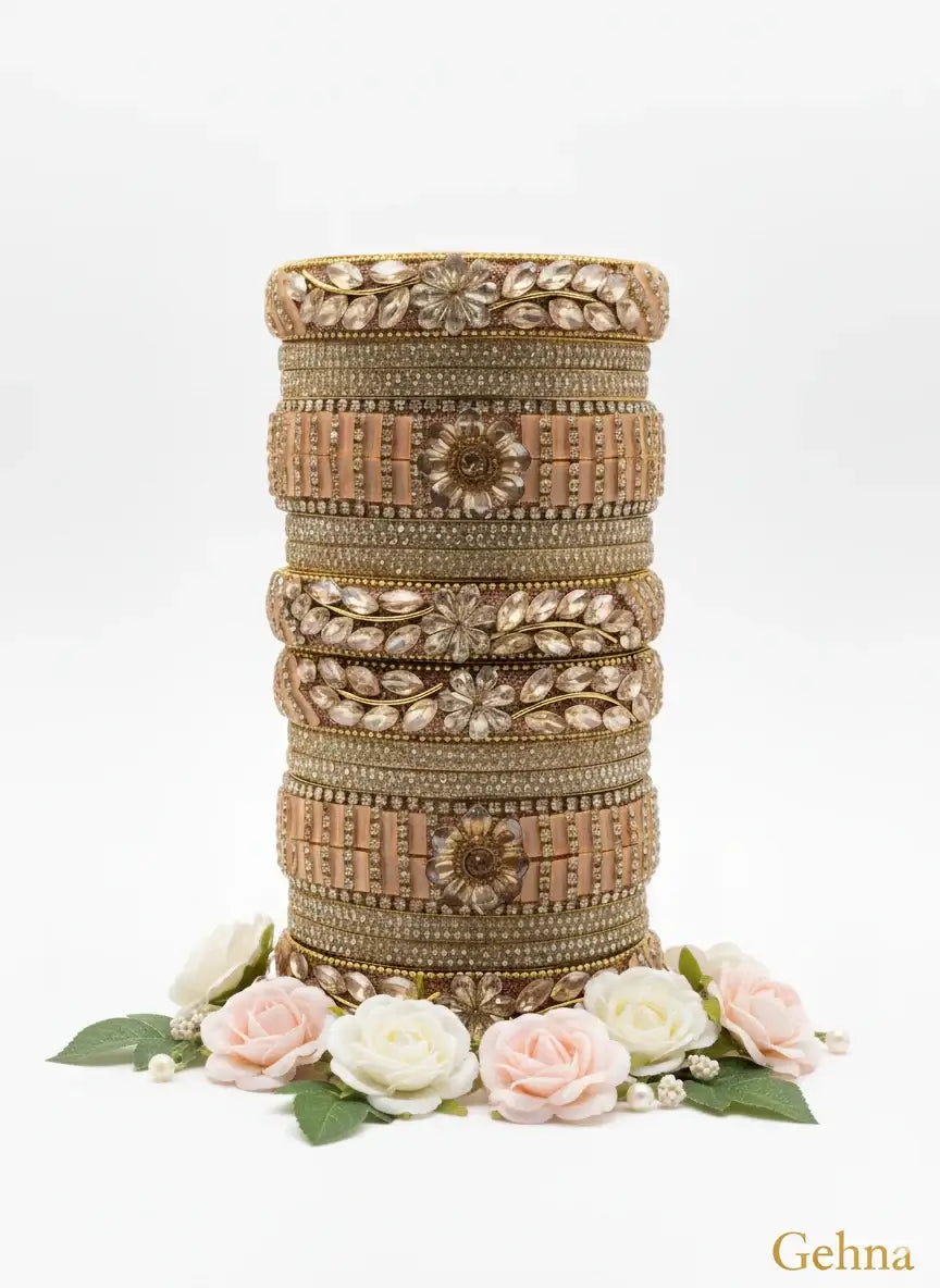 tylish Gold Plated Imitation Bangles Online | Gehna Jewellery displayed with floral accents.