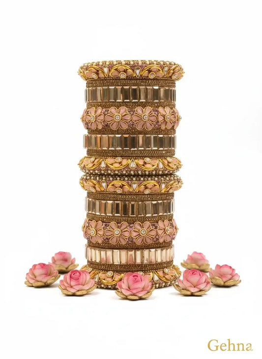 Peach & Gold Bridal Floral Bangles – Premium Ethnic Jewellery Set displayed with pink floral accents.
