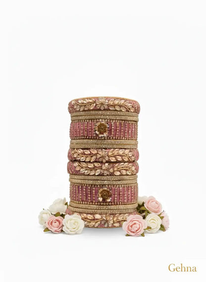 Pink Bridal Kundan Floral Bangles Set – Gehna displayed with floral accents on a white background.